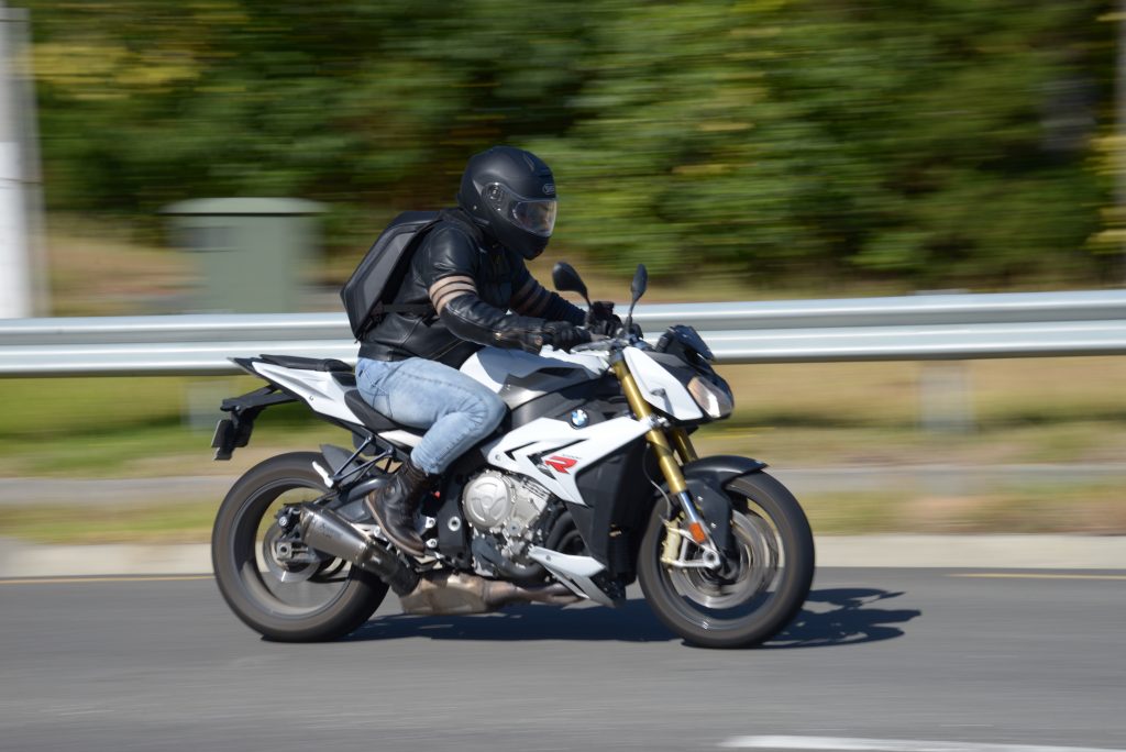 The site owner riding a BMW S1000R motorcycle.