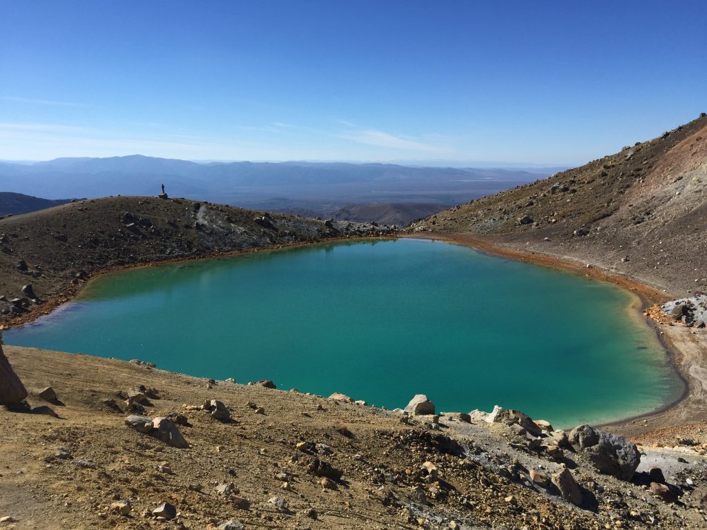 A cyan mineral lake near Mount Tongariro.