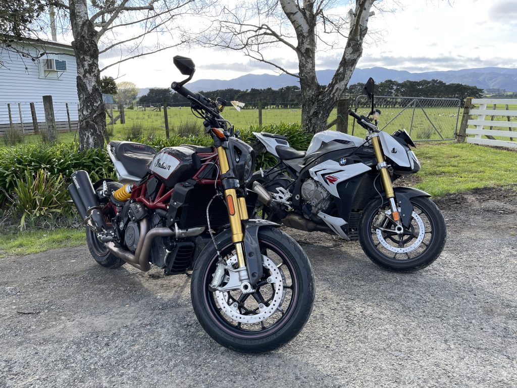 Indian FTR 1200 and BMW S1000R motorcycles in Pirinoa.