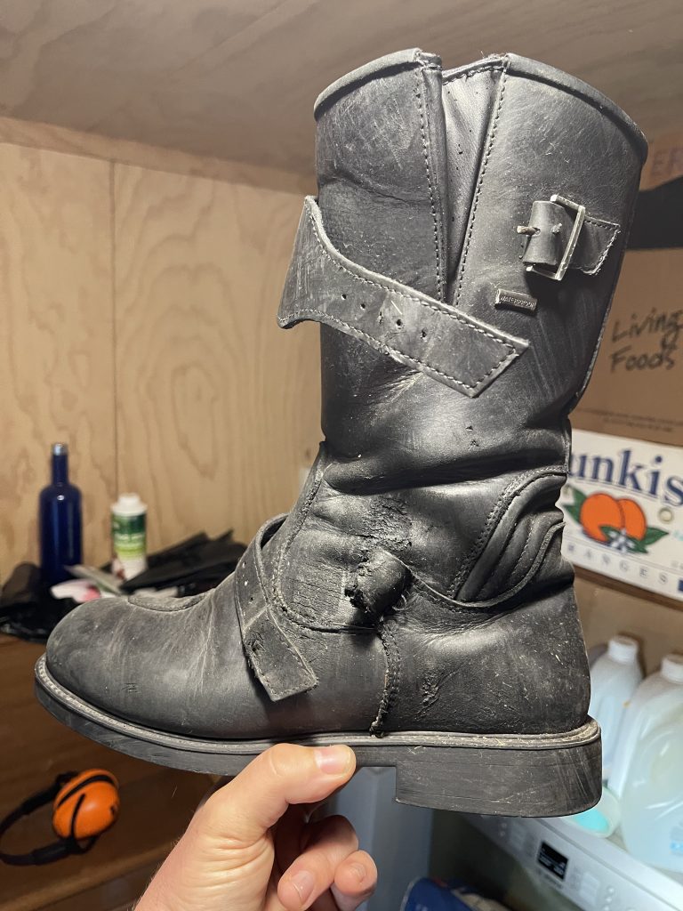 Damaged leather boot