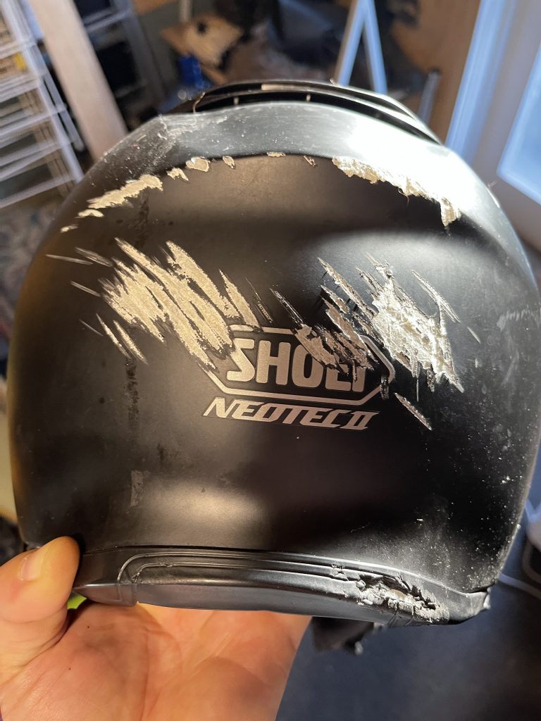 Helmet with abrasion.