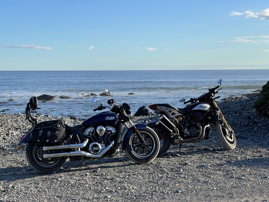 Indian Scout and Indian FTR 1200 motorcycles at the beach near Cape Palliser.